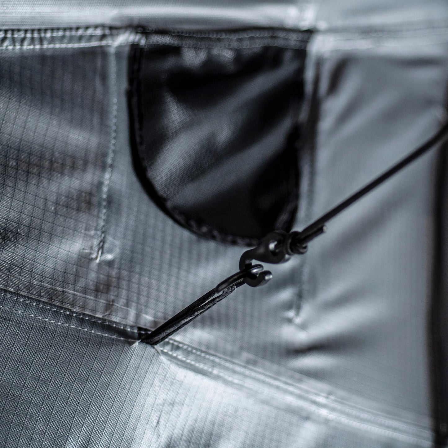Detail view of internal cables in Smittybilt Gen2 Overlander Tent, showing organized storage for camping essentials