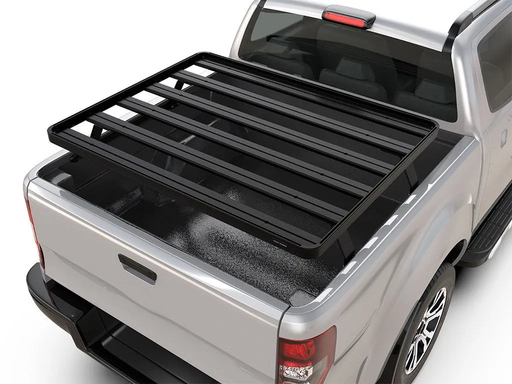 Chevrolet/GMC pickup truck equipped with FrontRunner Slimline 2 Full Truck Bed Rack Kit, rear angle view showing modular cargo rack for rooftop tents and gear