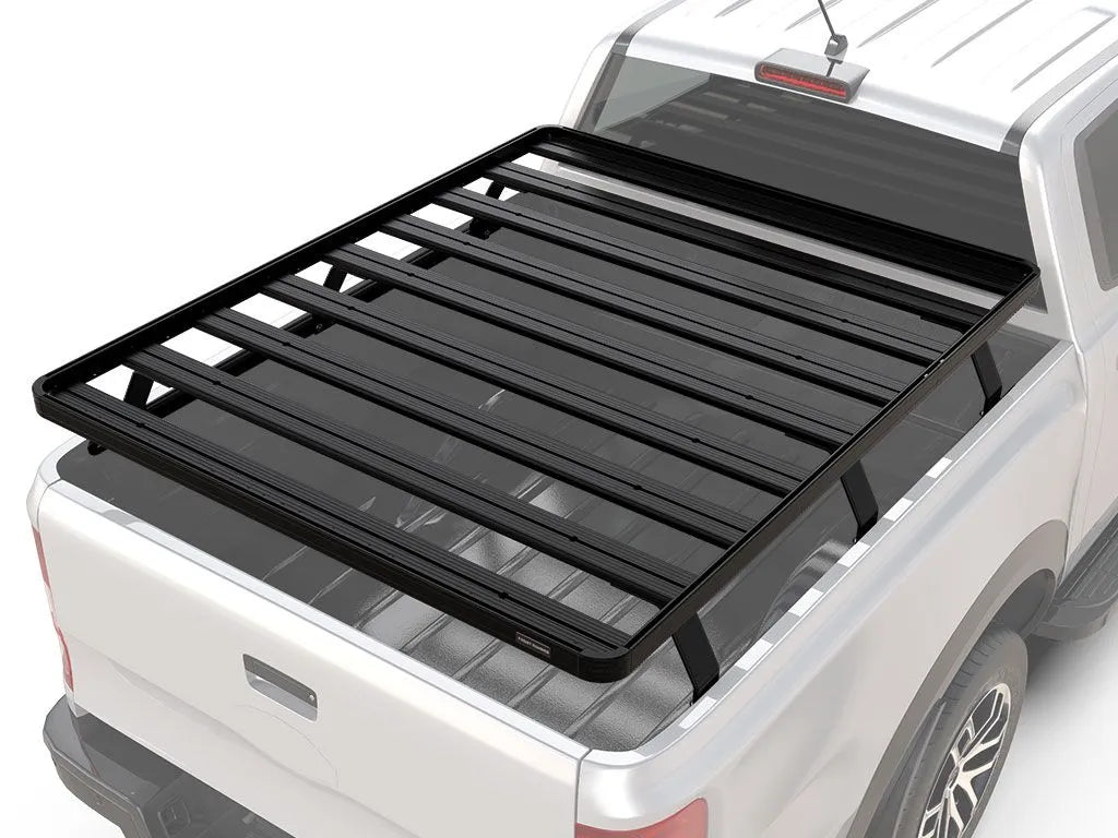 Ram pickup truck equipped with FrontRunner Slimline 2 Full Truck Bed Rack Kit, rear angle view showcasing modular rack system for rooftop tents and adventure gear