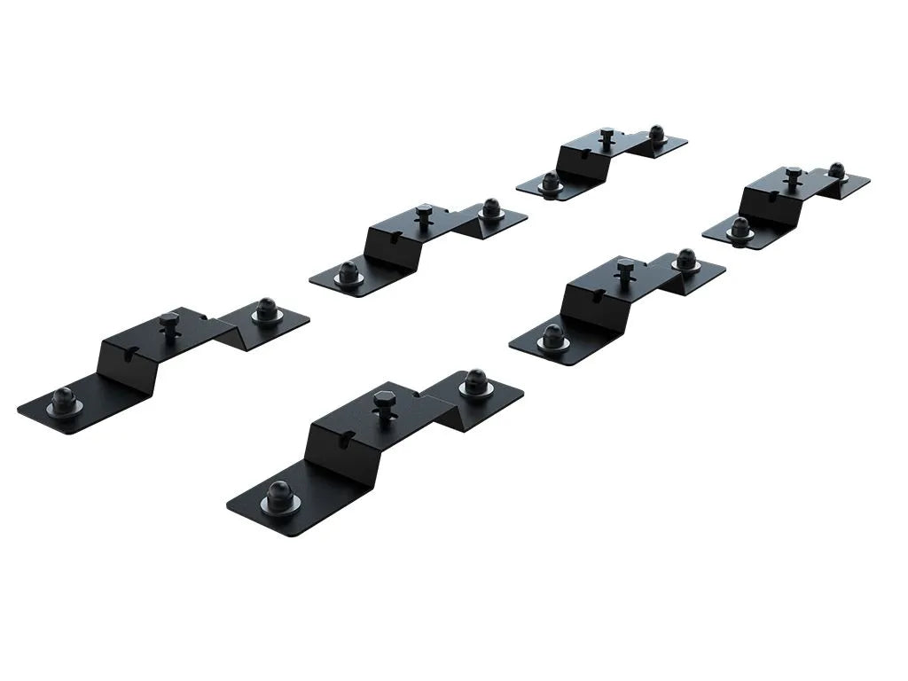 Close-up of FrontRunner Tent Mount Kit components, showing low-profile brackets and heavy-duty bolts for secure and aerodynamic rooftop tent mounting