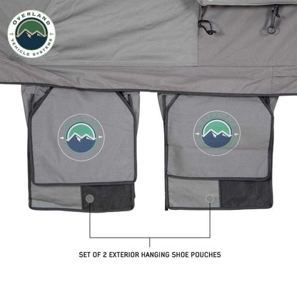 Exterior shoe bags mounted on OVS Nomadic Extended rooftop tent