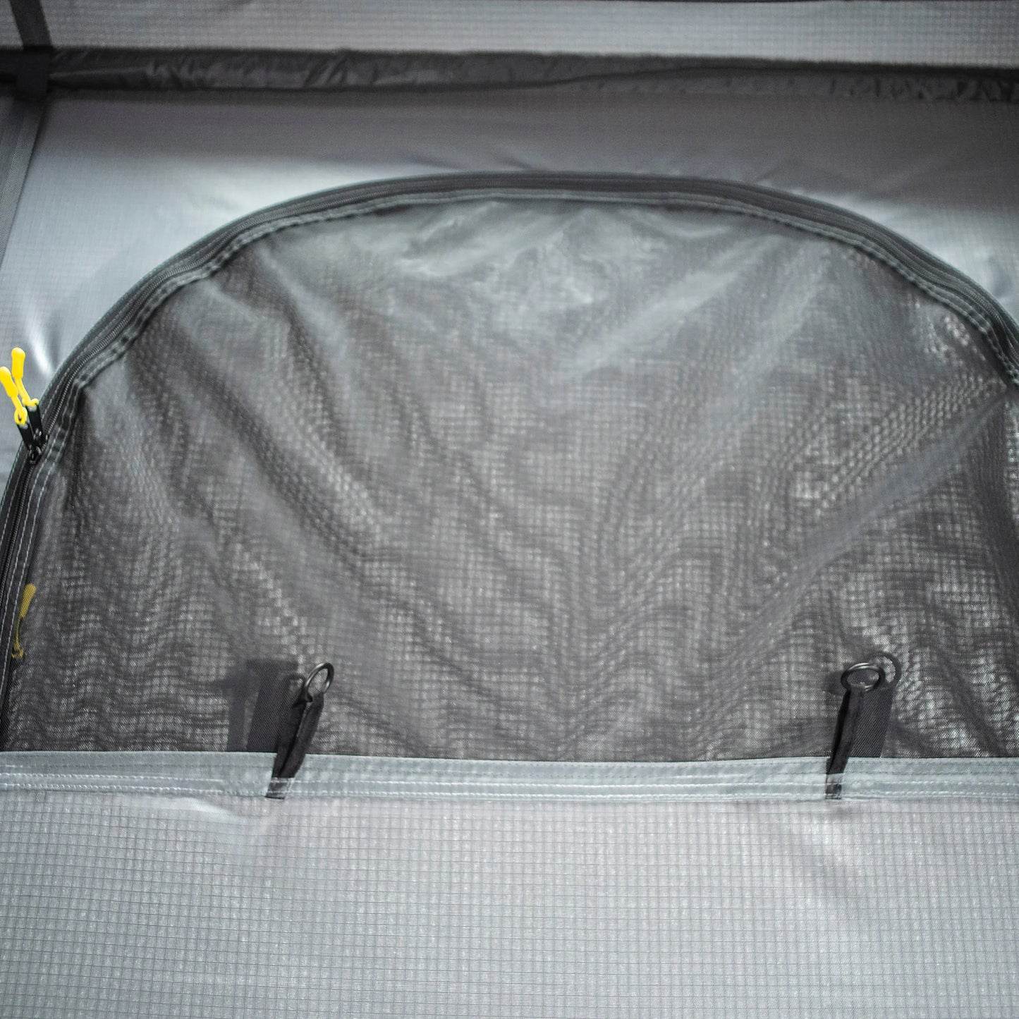 Exterior view of Smittybilt Gen2 Overlander Tent showing zippered window and mesh ventilation