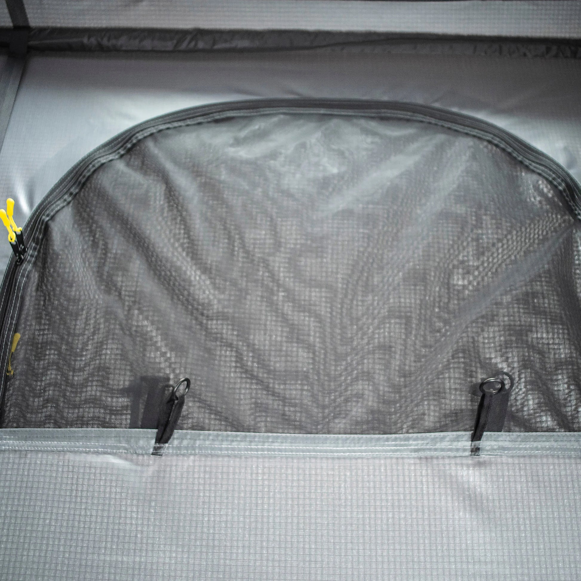 Exterior view of Smittybilt Gen2 Overlander Tent showing zippered window and mesh ventilation