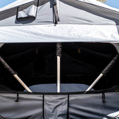 Smittybilt Gen2 Overlander Tent interior view showing mesh windows and skylight, designed for ventilation and comfort during overlanding trips