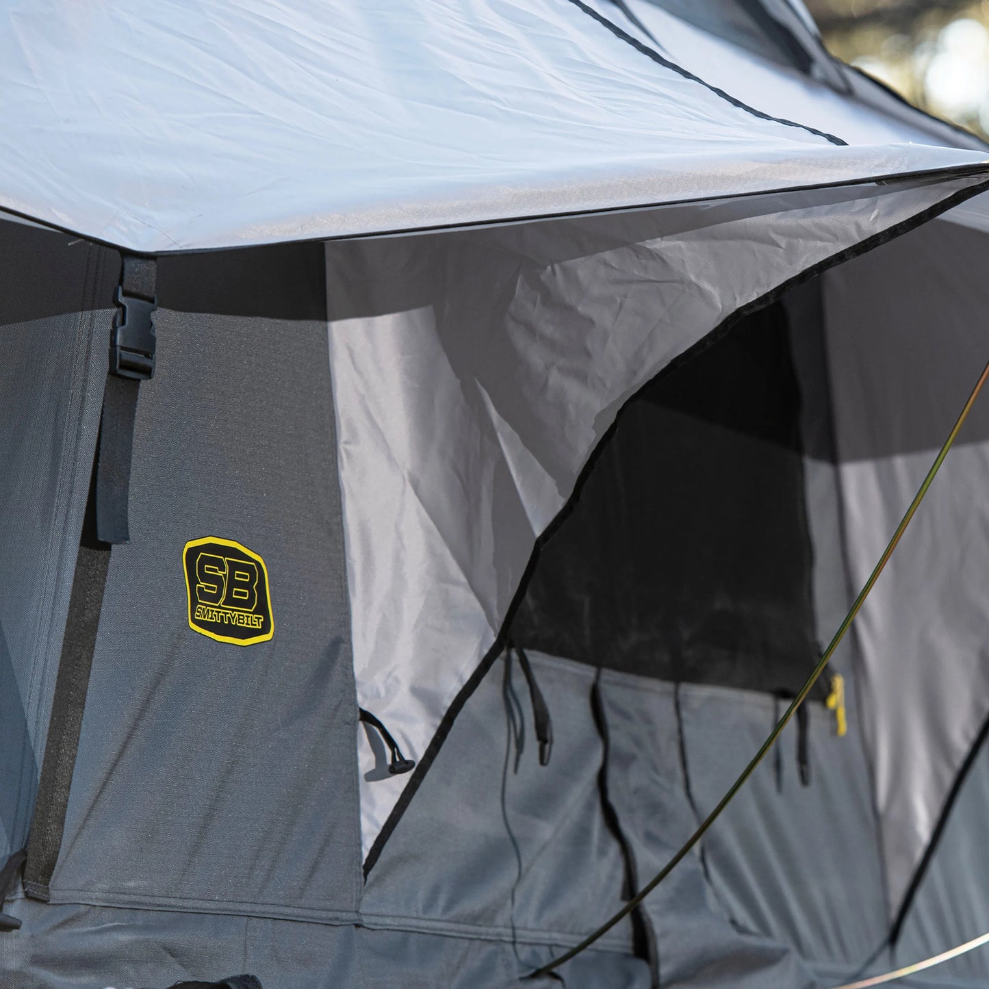 Awning and rainfly close-up on Smittybilt Gen2 Overlander Tent, highlighting all-weather durability and rugged fabric