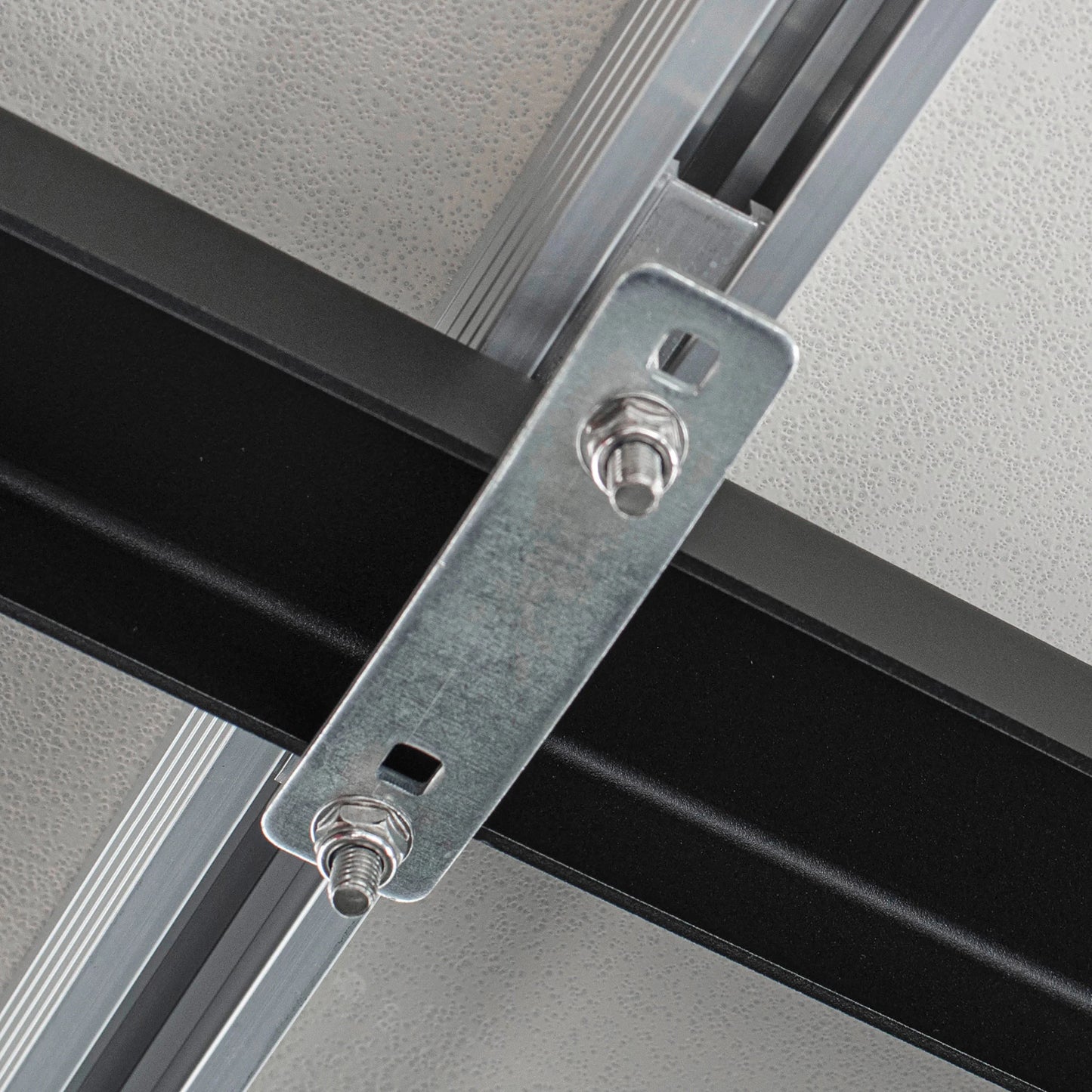 Bracket and mounting hardware detail shot on Smittybilt Gen2 Overlander Tent, showcasing secure rooftop installation