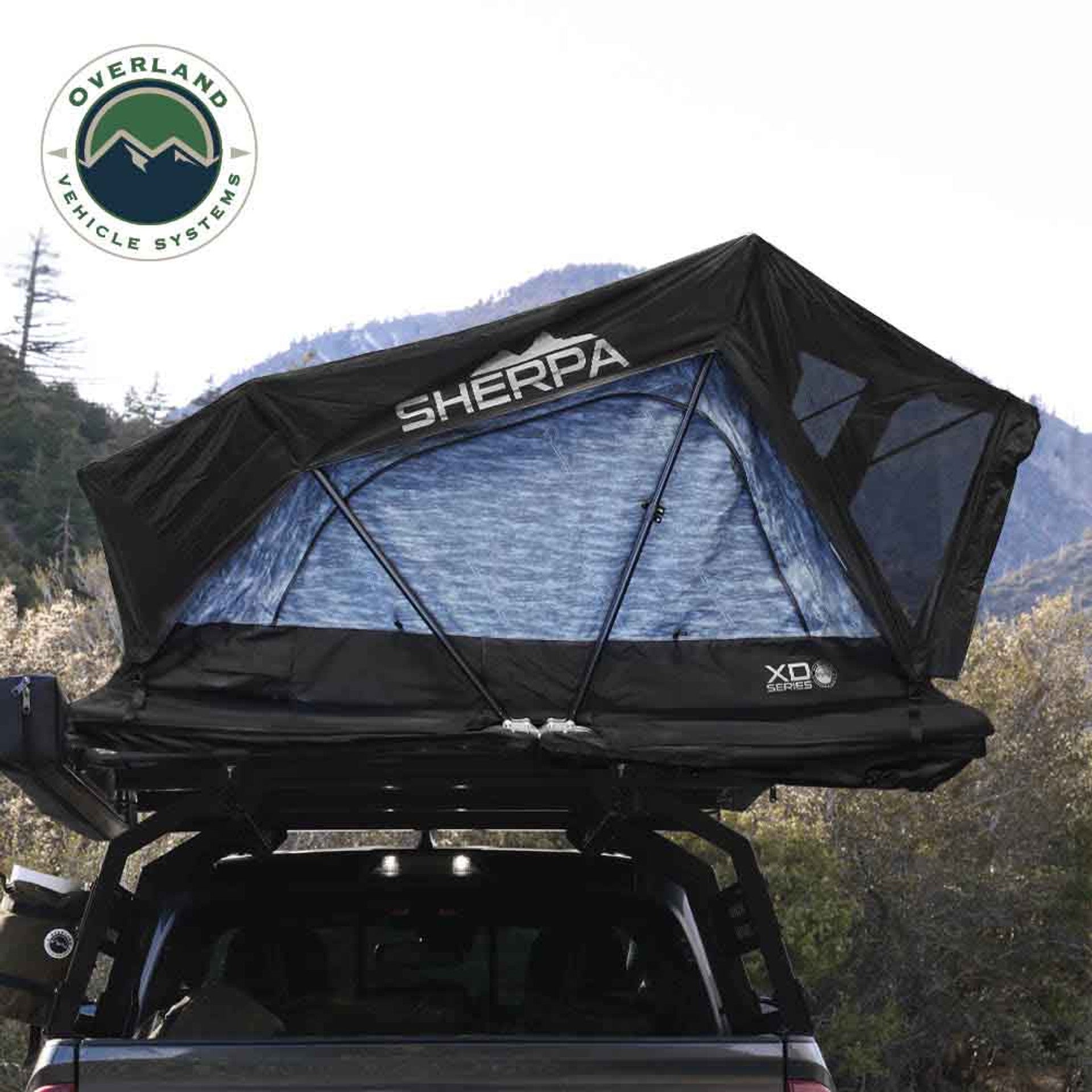 OVS XD Sherpa tent mounted on overland vehicle from rear angle