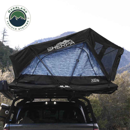 OVS XD Sherpa tent mounted on overland vehicle from rear angle