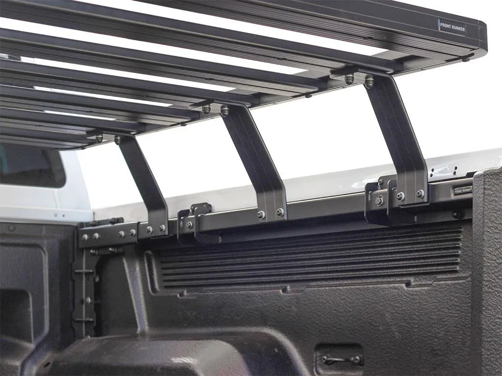 Side view of FrontRunner Slimline 2 Full Truck Bed Rack Kit mounted on Ford pickup, highlighting robust modular system for overlanding and cargo carrying