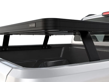 Close-up side view of FrontRunner Slimline 2 Full Truck Bed Rack Kit mounted on Nissan pickup, highlighting robust corner design and modular rack system for rooftop tents and overlanding gear