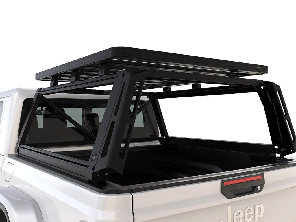 Rear angle close-up of FrontRunner Pro Bed Rack Kit mounted on Jeep Gladiator, highlighting robust load bed system for rooftop tents and gear