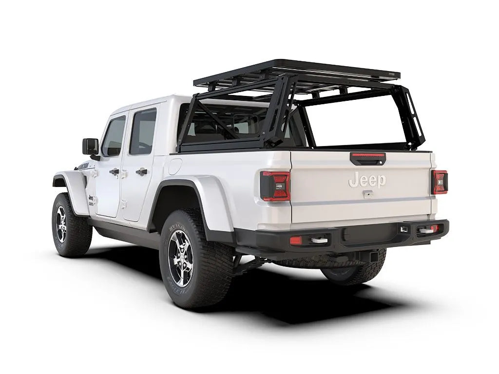 Jeep Gladiator fitted with FrontRunner Pro Bed Rack Kit and Slimline II Roof Rack, side view showing heavy-duty load bed rack system for adventure gear