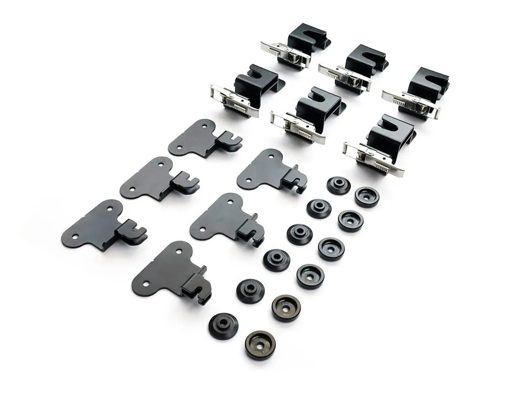 Complete FrontRunner Quick Release Tent Mount Kit with bolts, brackets, and locking latches, product shot displaying full 6-piece hardware set for secure rooftop tent mounting