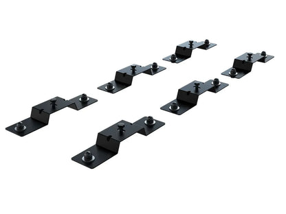 Close-up of FrontRunner Tent Mount Kit components, showing low-profile brackets and heavy-duty bolts for secure and aerodynamic rooftop tent mounting